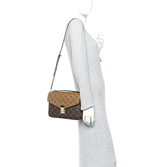 Reverse Monogram Pochette Metis
