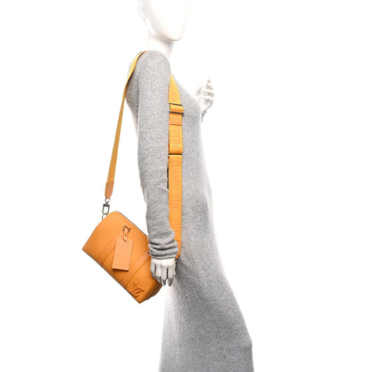 Grained Calfskin Aerogram City Keepall Safran Yellow