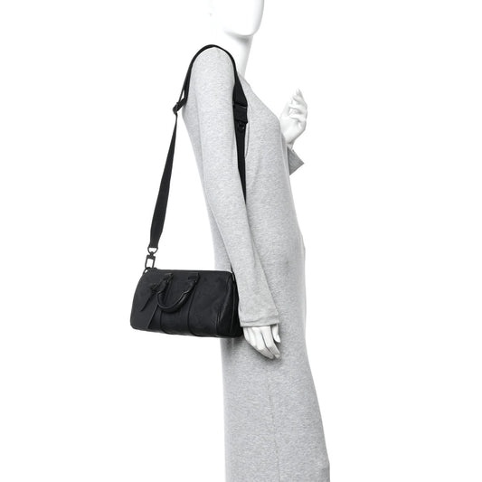 Monogram Taurillon Keepall Bandouliere 25 Black
