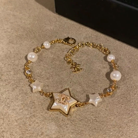 Chanel Pearl Star Necklace Bracelet Earrings