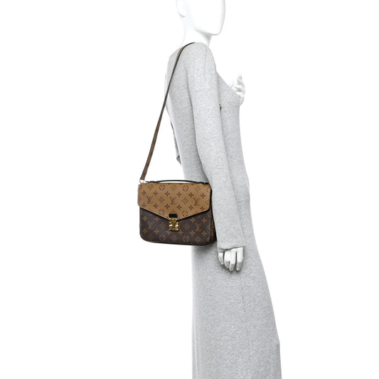 Reverse Monogram Pochette Metis