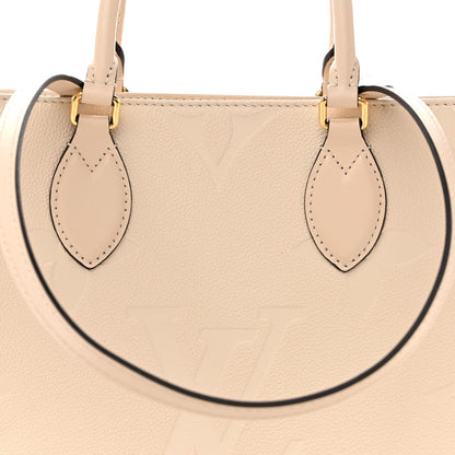 Empreinte Monogram Giant Onthego MM Creme