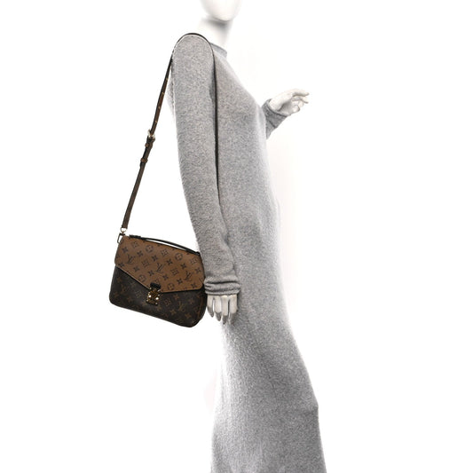 Reverse Monogram Pochette Metis
