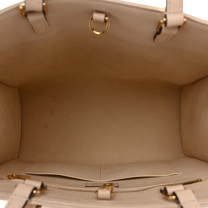 Empreinte Monogram Giant Onthego MM Creme